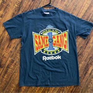 We all in the same gang VTG 90s REEBOK tshirt 
Used
Grand jury records